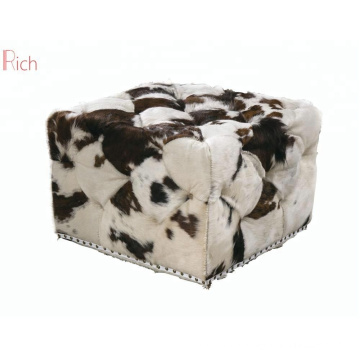 Storage Ottoman cowhide stool with copper studs around